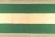 Bandera de Andalucía. Detalle de roturas y plieges en el tejido.